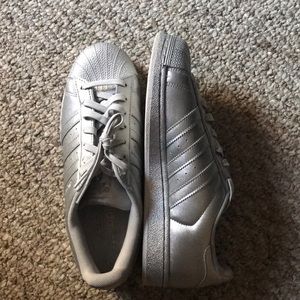 Silver Adidas superstars
